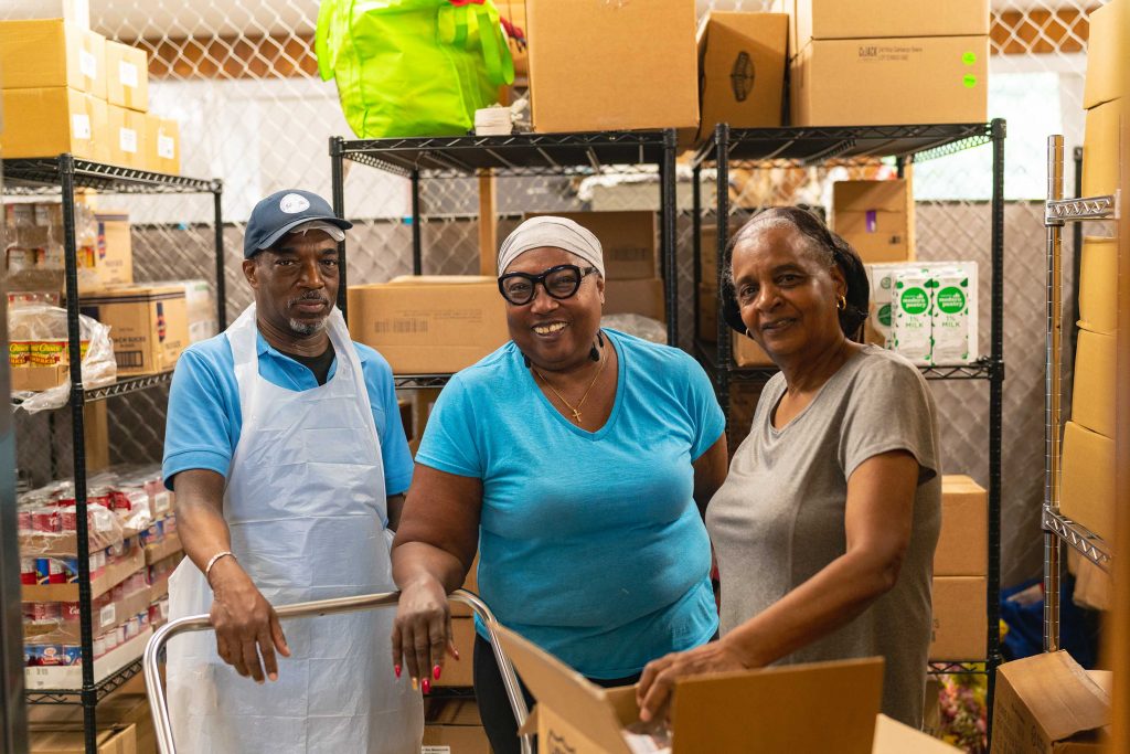 Volunteers working the food pantry